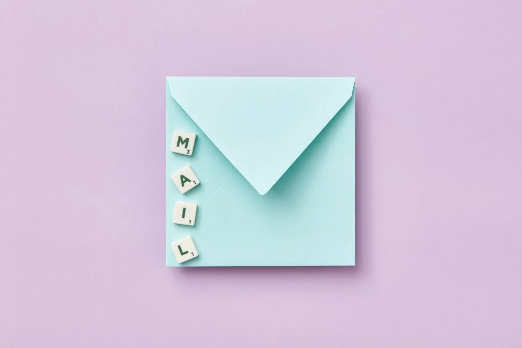scrabble tiles on an envelope